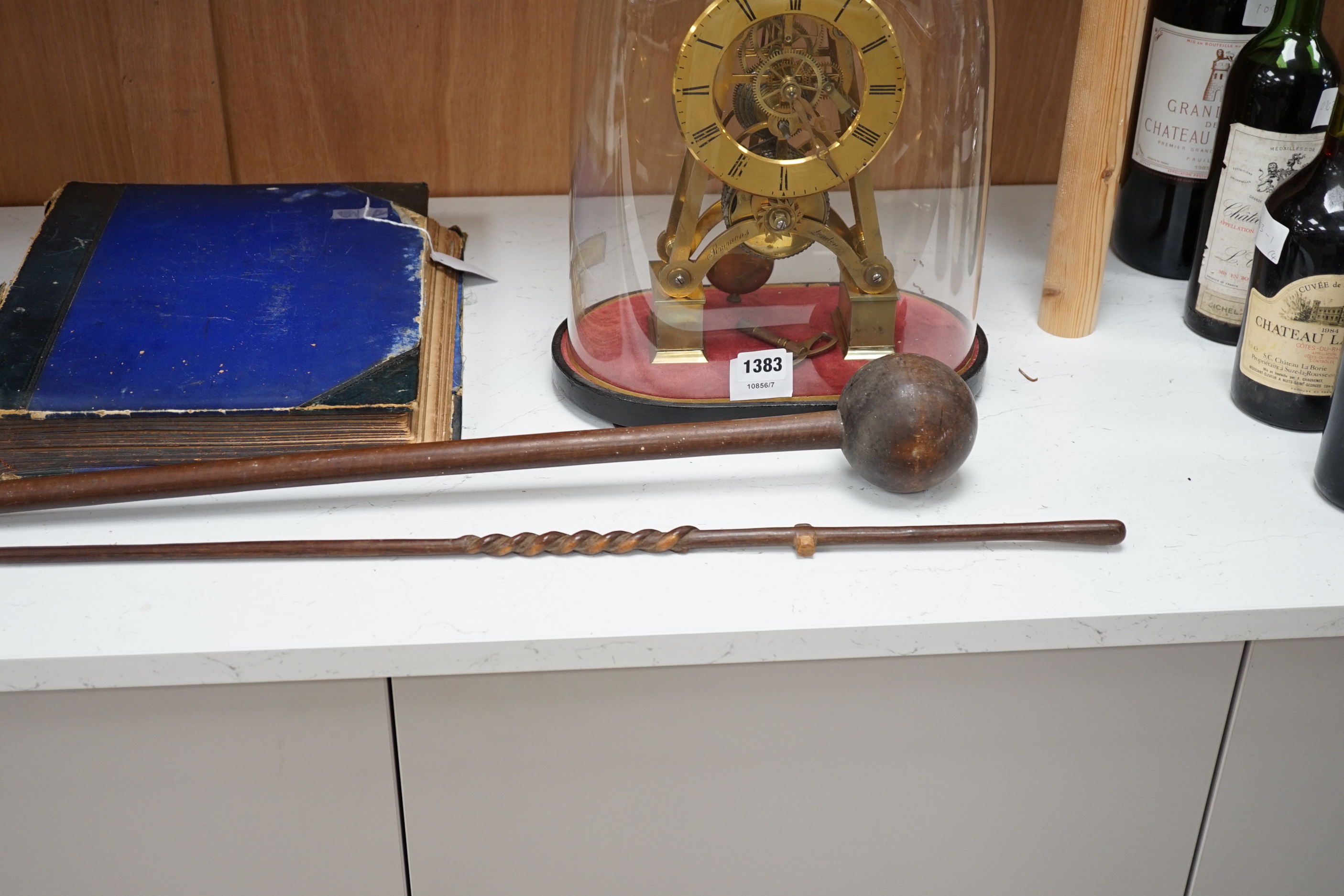 A knobkerrie and another tribal carving, longest 99cm
